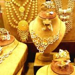 71228503-Gold-Jewellery-Store-Window-Dubai-City-of-Gold-Gold-Souk-Deira-Dubai-UAE-United-Arab-Emirates.jpg