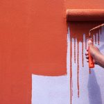 imgi_68_midsection-man-holding-orange-wall_1048944-1126378.jpg