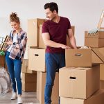 young-couple-packing-their-stuff-1200-x-600.jpg