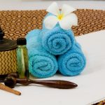 health-spa-with-white-flower-bottles-with-essential-oil-1.jpg