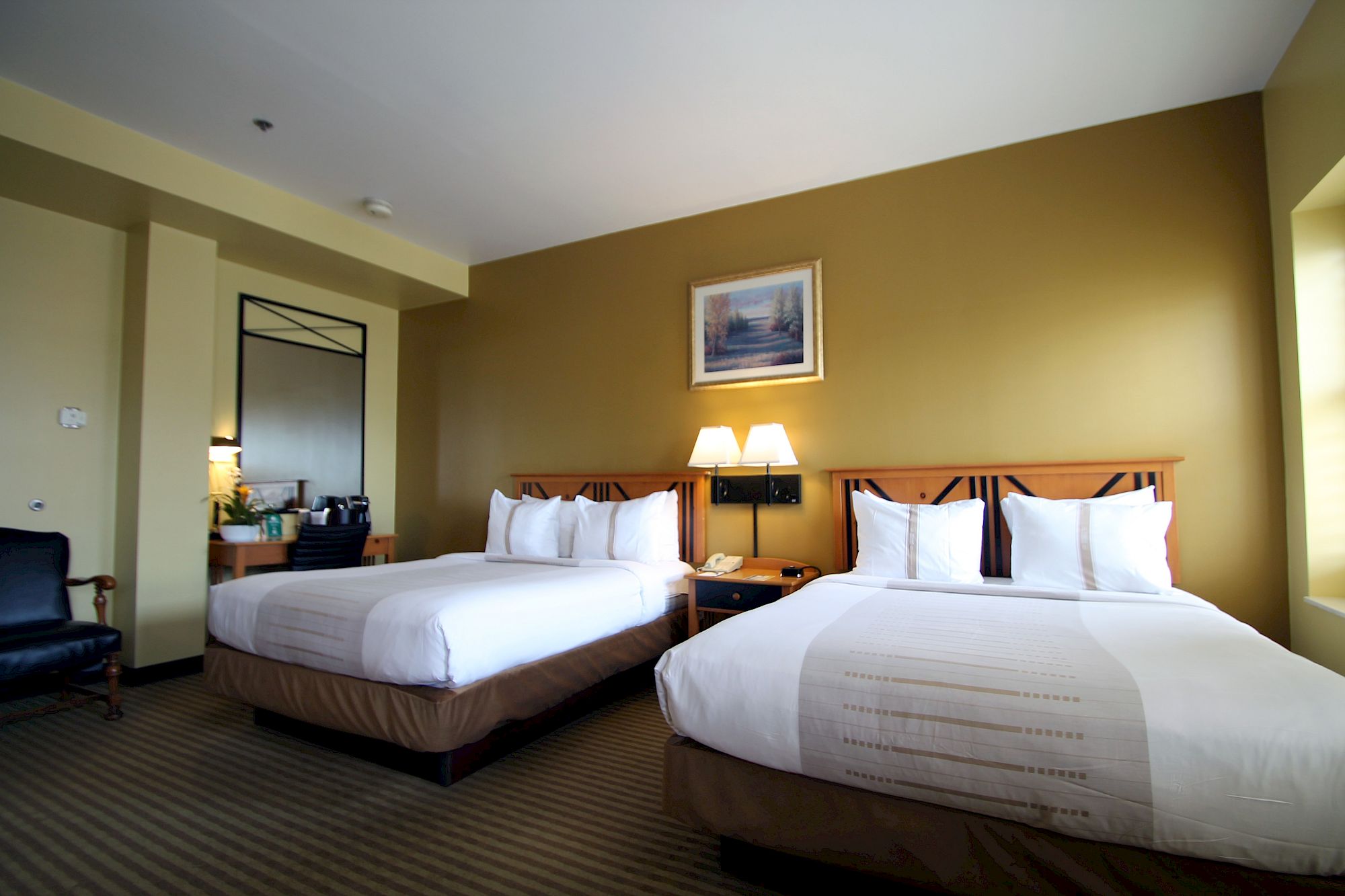 Double queen guest room at Crockett Hotel near Alamo Plaza San Antonio.