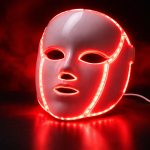 Glowing-red-LED-mask-against-darkness.png